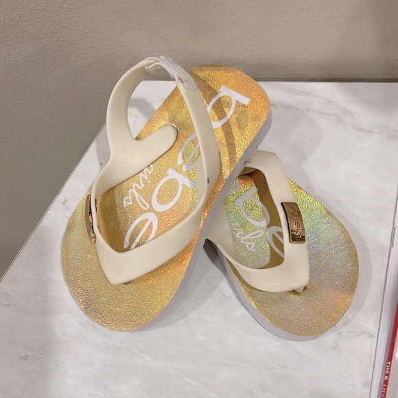 🔥bebe Gold and Cream Flip Flops🔥 - Picture 1 of 3